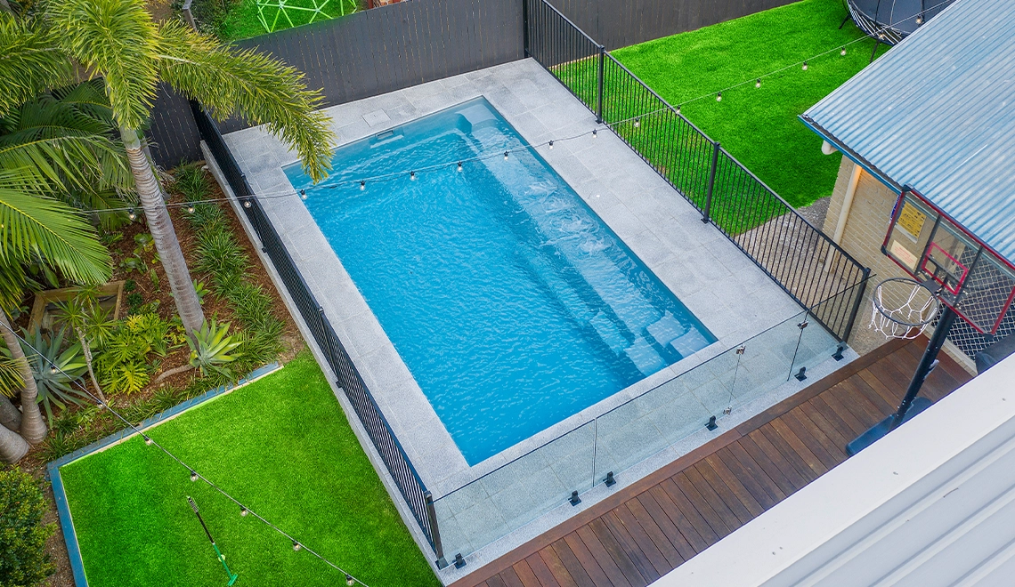 The Leisure Pools Reflection inground fiberglass pool