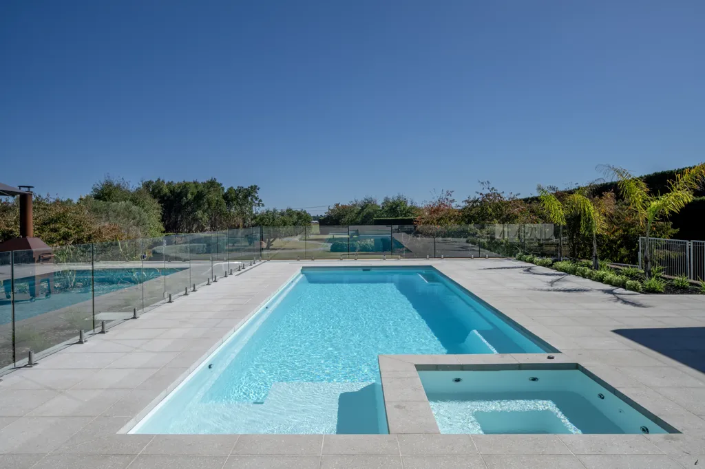 PIC LP ANZ Absolute Shimmer White NZ Pools Jul 2024 003 The Leisure Pools Absolute in Shimmer White, get yours from Leisure Pools Sassella